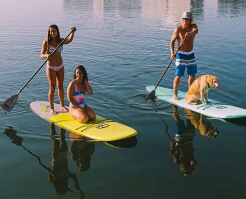 sup together on a two person paddle board